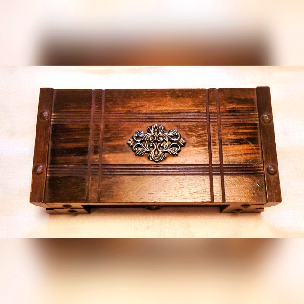 Vintage Wooden Jewelry Box with Intricate Silver Detail
